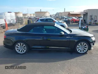 2018 Audi A5 Cabriolet Premium Plus z VIN WAUYNGF54JN008779, wystawiony jako IAAI lot #40763875 z przebiegiem 53 346 mil mil oraz . Historia ofert i sprzedaży dostępna na DreamBid. Obrazek 14.