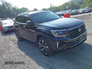 2024 Volkswagen Atlas SEL Premium R-Line with VIN 1V2FR2CA2RC598392, listed as a IAAI auction lot 42418130 with 5,007 mi miles and . Bid and sale history available at DreamBid. Image 1.