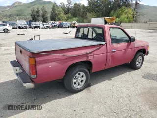1986 Nissan Hardbody E z VIN JN6ND11SXGW022401, wystawiony jako Copart lot #51545335 z przebiegiem 187 680 mil mil oraz Czysty tytuł • Clean title. Historia ofert i sprzedaży dostępna na DreamBid. Obrazek 3.