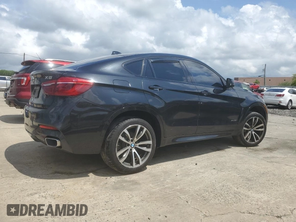 2015 BMW X6 xDrive35i z VIN 5UXKU2C58F0N77513, wystawiony jako Copart lot #55859345 z przebiegiem 82 560 mil mil oraz Szkoda całkowita • Salvage title. Historia ofert i sprzedaży dostępna na DreamBid. Obrazek 3.