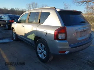 2016 Jeep Compass Sport with VIN 1C4NJCBA1GD743294, listed as a IAAI auction lot 41035177 with 124,379 mi miles. Bid and sale history available at carsss.com. Image 3.