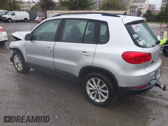 2017 Volkswagen Tiguan S with VIN WVGBV7AX4HK051172, listed as a IAAI auction lot 41843182 with 160,010 mi miles and . Bid and sale history available at DreamBid. Image 3.