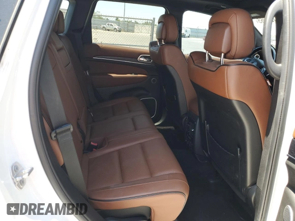 2018 Jeep Grand Cherokee Summit with VIN 1C4RJEJG9JC212554, listed as a Copart auction lot 63123065 with 82,976 mi miles and Salvage title. Bid and sale history available at DreamBid. Image 11.