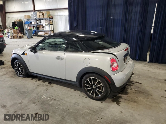 2013 MINI Cooper Coupe with VIN WMWSX1C50DT507354, listed as a Copart auction lot 48070765 with 98,830 mi miles and Salvage Title. Bid and sale history available at carsss.com. Image 2.