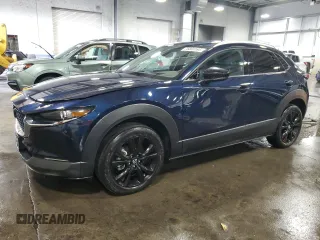 2023 Mazda CX-30 Premium Plus with VIN 3MVDMBEY0PM586088, listed as a Copart auction lot 76003164 with 6,633 mi miles and Salvage title. Bid and sale history available at DreamBid. Image 1.