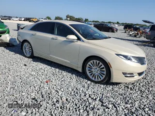 2016 Lincoln MKZ z VIN 3LN6L2G93GR615052, wystawiony jako Copart lot #54717335 z przebiegiem 86 575 mil mil oraz Szkoda całkowita • Salvage title. Historia ofert i sprzedaży dostępna na DreamBid. Obrazek 4.