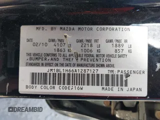 2010 Mazda Mazda3 s Grand Touring with VIN JM1BL1H66A1287127, listed as a IAAI auction lot 41387461 with 246,129 mi miles. Bid and sale history available at carsss.com. Image 9.