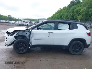 2023 Jeep Compass Latitude with VIN 3C4NJDBN3PT510424, listed as a IAAI auction lot 42385491 with 58,640 mi miles and . Bid and sale history available at DreamBid. Image 14.