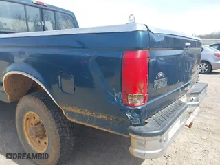 1997 Ford F-250 HD with VIN 1FTHX26F9VEB47885, listed as a IAAI auction lot 41820499 with 239,118 mi miles. Bid and sale history available at carsss.com. Image 12.