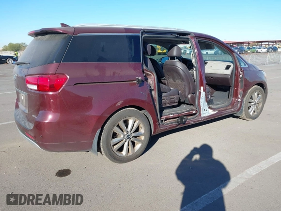 2015 Kia Sedona SX-L with VIN KNDME5C15F6046322, listed as a IAAI auction lot 41301459 with 76,026 mi miles and . Bid and sale history available at DreamBid. Image 4.