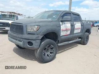 2013 Toyota Tundra 4WD Truck with VIN 5TFDW5F14DX279527, listed as a IAAI auction lot 41594899 with 212,973 mi miles. Bid and sale history available at carsss.com. Image 2.