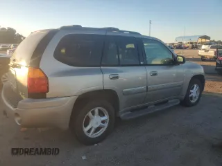 2003 GMC Envoy SLE with VIN 1GKDS13S932170188, listed as a Copart auction lot 82027964 with 266,978 mi miles and Clean Title. Bid and sale history available at carsss.com. Image 3.