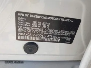 2013 BMW 5 Series 528i with VIN WBAXG5C59DDY32432, listed as a IAAI auction lot 41230673 with 103,069 mi miles and . Bid and sale history available at carsss.com. Image 9.