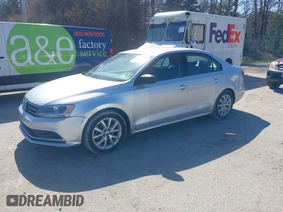 2015 Volkswagen Jetta Sedan 1.8T SE with VIN 3VWD17AJ0FM329783, listed as a IAAI auction lot 42142611 with 217,610 mi miles. Bid and sale history available at carsss.com. Image 2.
