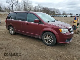 2019 Dodge Grand Caravan SXT with VIN 2C4RDGCG0KR579867, listed as a Copart auction lot 53170735 with 248,047 mi miles and Clean Title. Bid and sale history available at DreamBid. Image 4.
