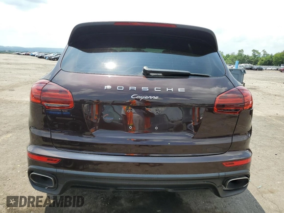 2016 Porsche Cayenne with VIN WP1AA2A24GKA14980, listed as a Copart auction lot 63139115 with 84,671 mi miles and Salvage title. Bid and sale history available at DreamBid. Image 6.