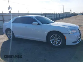 2018 Chrysler 300 Touring with VIN 2C3CCAAG5JH130184, listed as a IAAI auction lot 41479711 with 221,714 mi miles and . Bid and sale history available at DreamBid. Image 13.