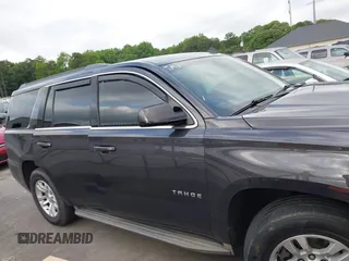 2015 Chevrolet Tahoe LS with VIN 1GNSCAKC0FR245826, listed as a IAAI auction lot 42282590 with 164,208 mi miles and . Bid and sale history available at DreamBid. Image 13.
