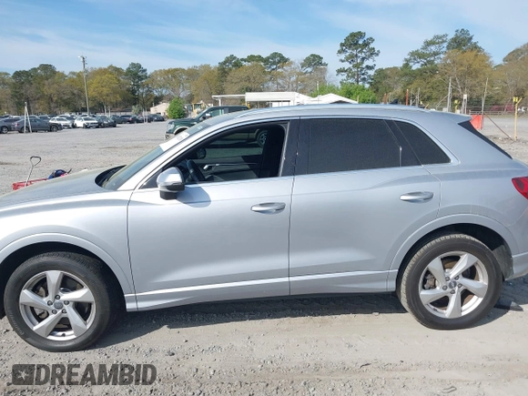 2020 Audi Q3 Premium with VIN WA1AECF36L1057823, listed as a IAAI auction lot 41912118 with 71,004 mi miles and . Bid and sale history available at DreamBid. Image 14.