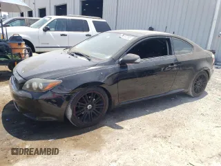 2009 Scion tC with VIN JTKDE167390302286, listed as a Copart auction lot 54697385 with 155,519 mi miles and Salvage Title. Bid and sale history available at carsss.com. Image 1.