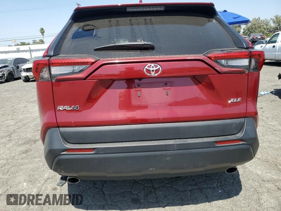 2023 Toyota RAV4 XLE with VIN 2T3W1RFV4PW267940, listed as a Copart auction lot 61827935 with 63,356 mi miles and Salvage title. Bid and sale history available at DreamBid. Image 6.