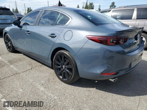 2024 Mazda 3 S Carbon Edition with VIN 3MZBPBCM1RM408173, listed as a Copart auction lot 48551675 with 451 mi miles and Clean title. Bid and sale history available at DreamBid. Image 2.