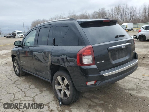 2016 Jeep Compass High Altitude Edition with VIN 1C4NJDEB8GD793474, listed as a Copart auction lot 50411085 with 73,640 mi miles and Salvage Title. Bid and sale history available at carsss.com. Image 2.