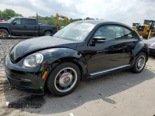 2015 Volkswagen Beetle Fleet Edition with VIN 3VWF17AT8FM656779, listed as a Copart auction lot 60291145 with 42,850 mi miles and Salvage title. Bid and sale history available at DreamBid. Image 1.