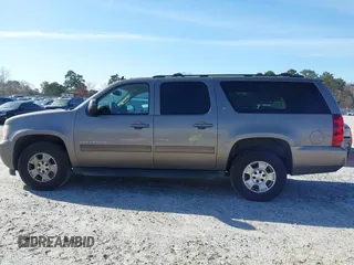 2011 Chevrolet Suburban LT with VIN 1GNSCJE00BR122636, listed as a IAAI auction lot 41594772 with 202,433 mi miles. Bid and sale history available at carsss.com. Image 13.