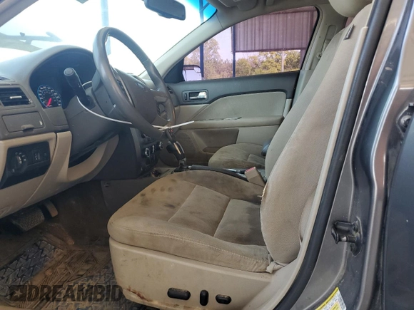 2011 Ford Fusion Hybrid with VIN 3FADP0L35BR180930, listed as a Copart auction lot 53066235 with 156,548 mi miles and Clean title. Bid and sale history available at DreamBid. Image 7.