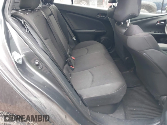 2021 Toyota Prius L Eco with VIN JTDKAMFU6M3140081, listed as a IAAI auction lot 42131187 with 103,973 mi miles and . Bid and sale history available at DreamBid. Image 8.
