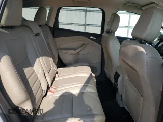 2018 Ford Escape Titanium z VIN 1FMCU0J95JUD44086, wystawiony jako Copart lot #58978865 z przebiegiem 90 874 mil mil oraz Szkoda całkowita • Salvage title. Historia ofert i sprzedaży dostępna na DreamBid. Obrazek 11.