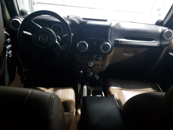 2012 Jeep Wrangler Unlimited Call of Duty MW3 with VIN 1C4BJWFGXCL105130, listed as a Copart auction lot 85747614 with 77,953 mi miles and Salvage title. Bid and sale history available at DreamBid. Image 8.