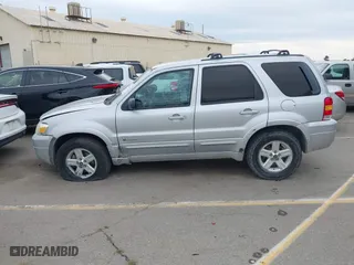 2005 Ford Escape Hybrid with VIN 1FMCU95H05KC95225, listed as a IAAI auction lot 41798610 with 216,659 mi miles. Bid and sale history available at carsss.com. Image 14.