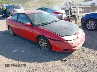 2002 Saturn SC with VIN 1G8ZY12742Z297685, listed as a IAAI auction lot 41930798 with Not Provided miles. Bid and sale history available at carsss.com. Image 1.