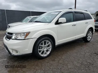 2013 Dodge Journey Crew with VIN 3C4PDCDG9DT537552, listed as a Copart auction lot 58126615 with 96,884 mi miles and Salvage title. Bid and sale history available at DreamBid. Image 1.