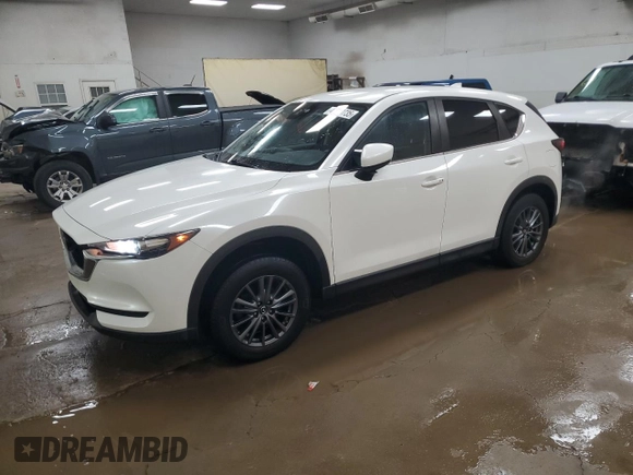 2019 Mazda CX-5 Touring with VIN JM3KFBCM1K0697500, listed as a Copart auction lot 46460735 with 69,412 mi miles and Salvage Title. Bid and sale history available at carsss.com. Image 1.