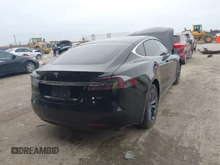 2018 Tesla Model S 75D with VIN 5YJSA1E22JF282828, listed as a IAAI auction lot 41595543 with 72,571 mi miles and . Bid and sale history available at DreamBid. Image 4.