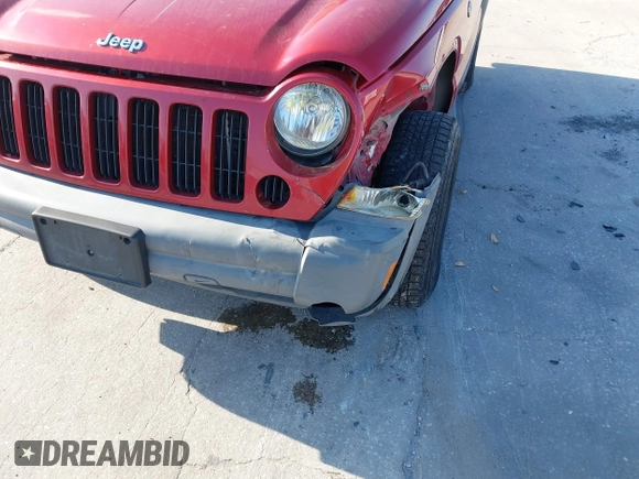 2005 Jeep Liberty Sport with VIN 1J4GL48K95W662399, listed as a IAAI auction lot 41900952 with 127,230 mi miles. Bid and sale history available at carsss.com. Image 6.