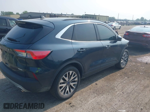 2022 Ford Escape Titanium with VIN 1FMCU9J93NUB50196, listed as a IAAI auction lot 42420209 with 22,210 mi miles and . Bid and sale history available at DreamBid. Image 4.