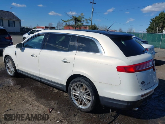 2013 Lincoln MKT EcoBoost with VIN 2LMHJ5AT8DBL55167, listed as a IAAI auction lot 41894396 with 121,114 mi miles. Bid and sale history available at carsss.com. Image 3.