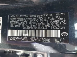 2021 Toyota Corolla SE with VIN JTDS4MCE5MJ056494, listed as a IAAI auction lot 41936866 with 128,257 mi miles. Bid and sale history available at carsss.com. Image 9.