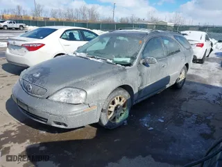 2004 Mercury Sable LS Premium with VIN 1MEFM59S64A608491, listed as a IAAI auction lot 41599768 with 183,667 mi miles. Bid and sale history available at carsss.com. Image 2.