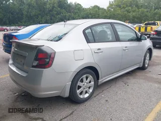 2011 Nissan Sentra S with VIN 3N1AB6AP6BL633513, listed as a IAAI auction lot 42783361 with 124,088 mi miles and . Bid and sale history available at DreamBid. Image 4.