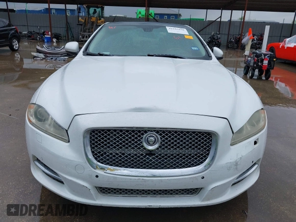 2012 Jaguar XJ with VIN SAJWA1CB7CLV35339, listed as a IAAI auction lot 41945850 with 123,501 mi miles and . Bid and sale history available at DreamBid. Image 6.