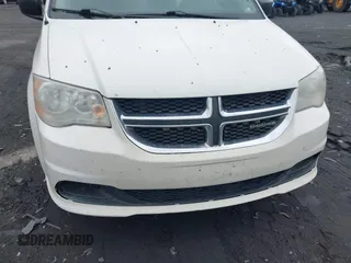 2011 Dodge Grand Caravan SXT with VIN 2D4RN4DGXBR633009, listed as a IAAI auction lot 42177861 with 119,901 mi miles and . Bid and sale history available at DreamBid. Image 6.