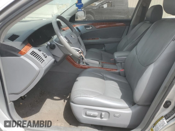 2005 Toyota Avalon XL z VIN 4T1BK36B55U019491, wystawiony jako Copart lot #50530335 z przebiegiem 111 698 mil mil oraz Szkoda całkowita • Salvage title. Historia ofert i sprzedaży dostępna na DreamBid. Obrazek 7.