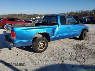 1999 Dodge Dakota SLT with VIN 1B7GL22X5XS321879, listed as a Copart auction lot 84015834 with 210,252 mi miles and Salvage Title. Bid and sale history available at carsss.com. Image 3.