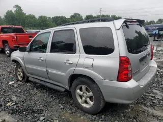 2005 Mazda Tribute LX with VIN 4F2YZ94185KM47932, listed as a Copart auction lot 63587744 with 203,178 mi miles and Salvage Title. Bid and sale history available at carsss.com. Image 2.