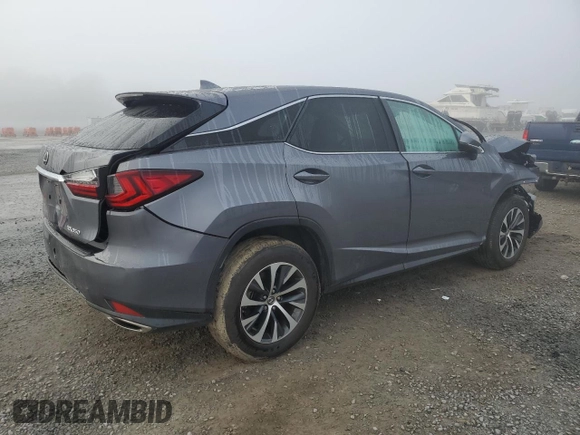 2021 Lexus RX with VIN 2T2AZMDA0MC279915, listed as a Copart auction lot 85444754 with 31,391 mi miles and Salvage Title. Bid and sale history available at carsss.com. Image 3.